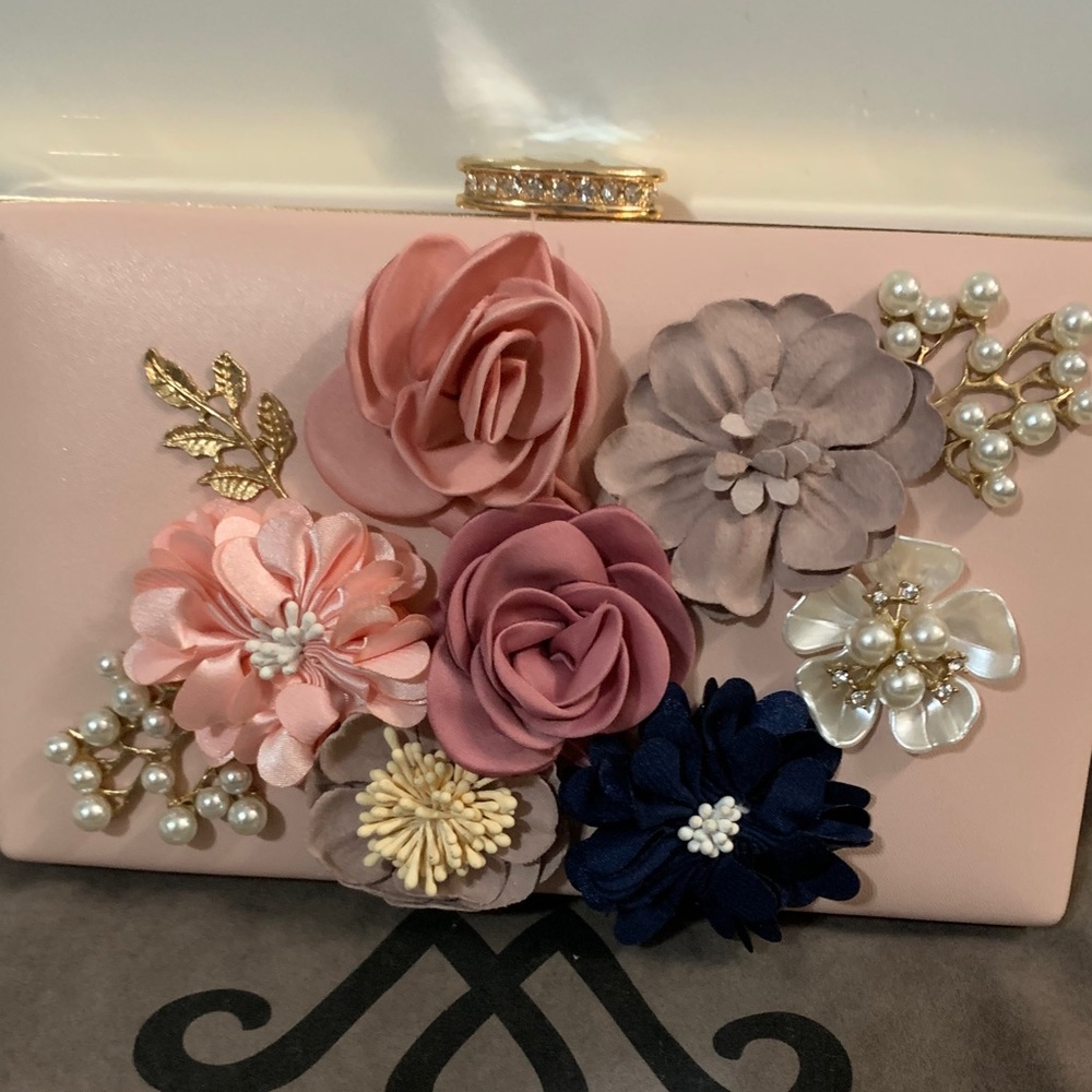 Pink clutch with 3-d flowers